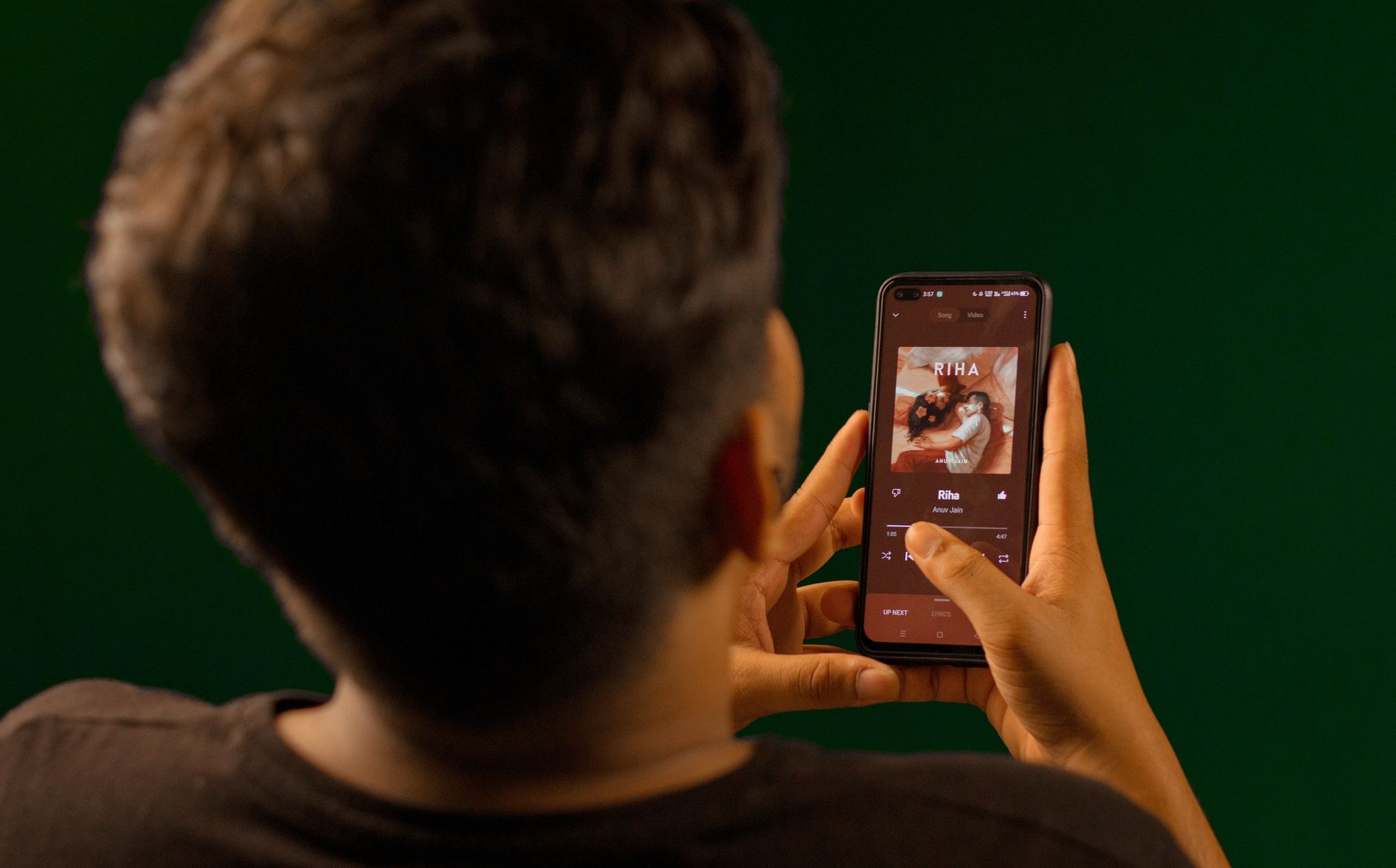 smartphone showing music streaming app playlist