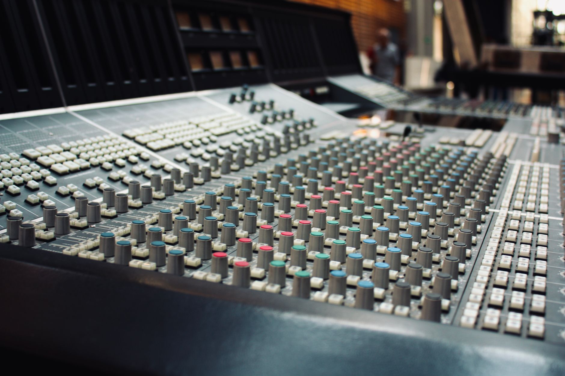 Vinyl records and studio mixing console